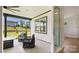 Relaxing covered patio with outdoor seating and ceiling fan at 917 Black Beard Dr, Denver, NC 28037