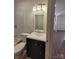 Updated bathroom with white subway tile and modern vanity at 1116 East Dr, Gastonia, NC 28052