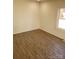 Spacious bedroom with neutral walls and wood flooring at 1116 East Dr, Gastonia, NC 28052