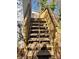 Stairs leading down from the deck to the backyard at 1116 East Dr, Gastonia, NC 28052