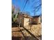 Side view of newly renovated stone house at 1116 East Dr, Gastonia, NC 28052