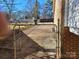 Side yard with gate and brick wall at 1116 East Dr, Gastonia, NC 28052