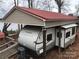 RV with carport and storage at 119 River Ridge Trl # E175/176, Mount Gilead, NC 27306