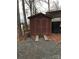 Exterior of a brown wooden storage shed at 119 River Ridge Trl # E175/176, Mount Gilead, NC 27306