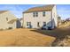 Large backyard with grassy area, providing plenty of outdoor space at 144 Mooring Dr, Statesville, NC 28677