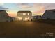 Expansive backyard with manicured lawn, perfect for outdoor activities and gatherings at 144 Mooring Dr, Statesville, NC 28677