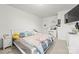 A spacious bedroom features a cozy bed with plush pillows and a soft, patterned comforter at 144 Mooring Dr, Statesville, NC 28677
