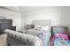 Cozy bedroom featuring a comfortable bed, carpeted floors, and bright, natural light at 144 Mooring Dr, Statesville, NC 28677