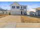 Two-story house with a front yard and attached garage at 144 Mooring Dr, Statesville, NC 28677
