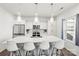 Modern eat-in kitchen featuring a large kitchen island with pendant lights at 144 Mooring Dr, Statesville, NC 28677