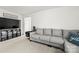 Comfortable living room with gray sofa, media console, and cozy decor at 144 Mooring Dr, Statesville, NC 28677