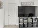 Cozy living room featuring television, console table, and decorative storage baskets at 144 Mooring Dr, Statesville, NC 28677