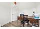 Home office with wood desk, black chair, and natural light at 144 Mooring Dr, Statesville, NC 28677