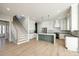 Modern kitchen with white cabinets, an island, and stainless steel appliances at 1812 Pin Oak Ct, Fort Mill, SC 29715