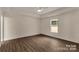 A bedroom with a ceiling fan and a window at 2227 Charlotte Hwy, York, SC 29745