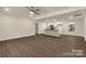 Bright open-concept layout featuring stylish flooring, recessed lighting, and kitchen with stainless appliances at 2227 Charlotte Hwy, York, SC 29745