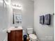 Clean bathroom with updated vanity and built in shelving at 2609 Lamp Post Ln, Kannapolis, NC 28081