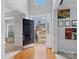 Bright entryway with hardwood floors and view to the street at 2609 Lamp Post Ln, Kannapolis, NC 28081