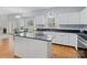 Kitchen with island, stainless steel appliances, and granite countertops at 2609 Lamp Post Ln, Kannapolis, NC 28081