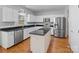 Galley kitchen with island, stainless steel appliances, and granite countertops at 2609 Lamp Post Ln, Kannapolis, NC 28081