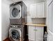 Convenient laundry room with stacked washer and dryer at 2609 Lamp Post Ln, Kannapolis, NC 28081