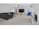Spacious living room with fireplace and large sectional sofa at 2609 Lamp Post Ln, Kannapolis, NC 28081