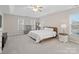 Bright bedroom with king bed and neutral color palette at 2609 Lamp Post Ln, Kannapolis, NC 28081