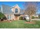 Brick home with a two-car garage and landscaped lawn at 3131 9Th Street Ne Dr # 16, Hickory, NC 28601