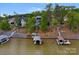 Lakefront property with private dock and lush landscaping at 3255 Lake Pointe Dr, Belmont, NC 28012