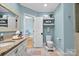 Light and bright bathroom with granite vanity and floating shelves at 3255 Lake Pointe Dr, Belmont, NC 28012