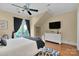 Comfortable bedroom with hardwood floors and access to balcony at 3255 Lake Pointe Dr, Belmont, NC 28012