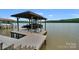 Covered boat lift and spacious dock perfect for lake access at 3255 Lake Pointe Dr, Belmont, NC 28012