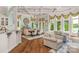 Bright dining area with lake views and hardwood floors at 3255 Lake Pointe Dr, Belmont, NC 28012