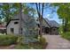 Elegant two-story home with stone accents and a three-car garage at 3255 Lake Pointe Dr, Belmont, NC 28012