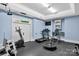 Home gym with various equipment including treadmill and elliptical at 3255 Lake Pointe Dr, Belmont, NC 28012