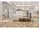 White kitchen with granite countertops and a large island at 3255 Lake Pointe Dr, Belmont, NC 28012