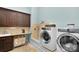 Laundry room with washer, dryer, and dog washing station at 3255 Lake Pointe Dr, Belmont, NC 28012