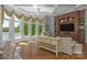 Relaxing living area with lake views and a built-in entertainment center at 3255 Lake Pointe Dr, Belmont, NC 28012