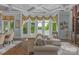 Spacious living room with lake views, featuring a built-in entertainment center at 3255 Lake Pointe Dr, Belmont, NC 28012