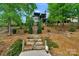 Stone steps leading down to a private lakefront dock at 3255 Lake Pointe Dr, Belmont, NC 28012