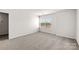 Spacious bedroom with neutral carpeting and large window at 3680 Charles Nw St, Conover, NC 28613