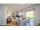Open concept dining area with a round table and access to backyard at 3680 Charles Nw St, Conover, NC 28613