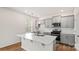 Modern kitchen with gray cabinets and a large island at 3680 Charles Nw St, Conover, NC 28613