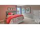bedroom with pink bedding and wall decor at 3686 Charles Nw St, Conover, NC 28613