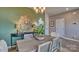 Bright dining room with modern chandelier and accent wall at 3686 Charles Nw St, Conover, NC 28613