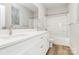 Modern bathroom with double vanity and a shower/tub combo at 4119 Pebblebrook Sw Cir, Concord, NC 28027
