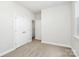 Spacious bedroom with neutral walls, carpet flooring, and double door closet at 4119 Pebblebrook Sw Cir, Concord, NC 28027