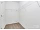 Walk-in closet with wire shelving for ample storage at 4119 Pebblebrook Sw Cir, Concord, NC 28027