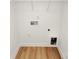 Convenient laundry room with hookups and shelving at 4119 Pebblebrook Sw Cir, Concord, NC 28027