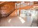 Living room with open concept kitchen and loft area at 604 N Central Ave, Locust, NC 28097